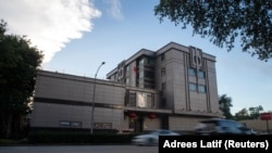 U.S. -- Vehicles pass by the China Consulate General in Houston, Texas, July 22, 2020