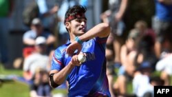 Afghanistan bowler Hamid Hassan sends down a delivery to the Scotland batsman